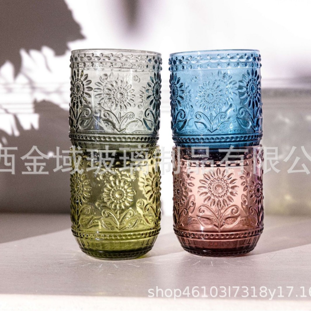 Taza de agua de vidrio con patrón de color de flor de sol en relieve retro al por mayor, taza de jugo de leche para el hogar de girasol, taza de bebida fría