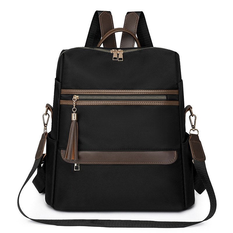 2024 verano nuevo estilo señoras mochila de nailon moda borla gran capacidad contraste color viaje mochila de un solo hombro al por mayor