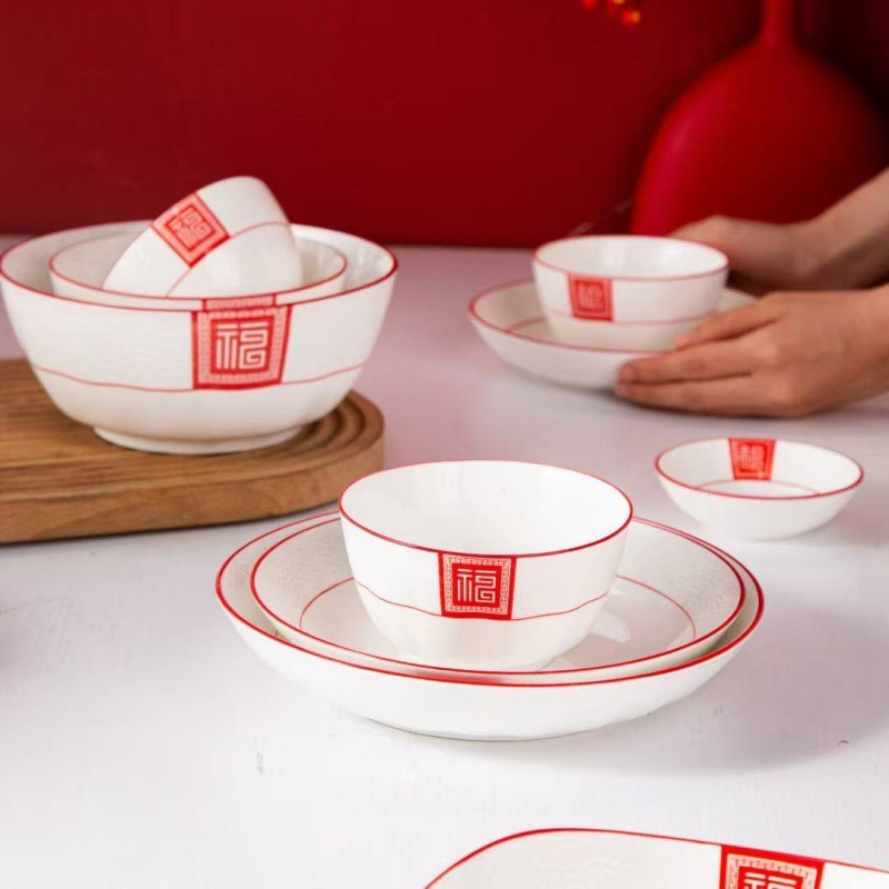 Serie de tallas de color esmalte de Año Nuevo Celebrado cubiertos de cerámica china rojos platos de platos de arroz caseros