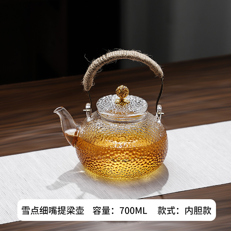 Venta directa de fábrica Tetera de vidrio con alto contenido de borosilicato Tetera de espuma con patrón de martillo de viga de elevación de metal Tetera de vidrio de alta calidad para el hogar