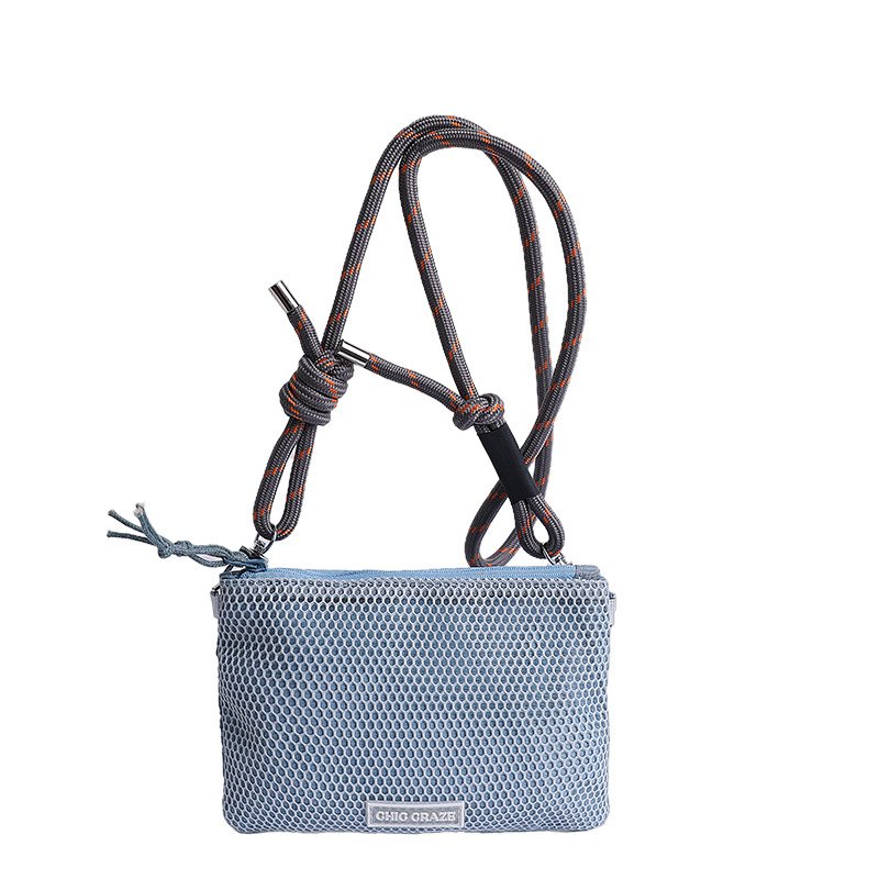 Bolsos pequeños de moda coreana 2025 verano nuevo estilo bolso femenino bolso de hombro de malla hueca bolso de mensajero de letras casuales marea