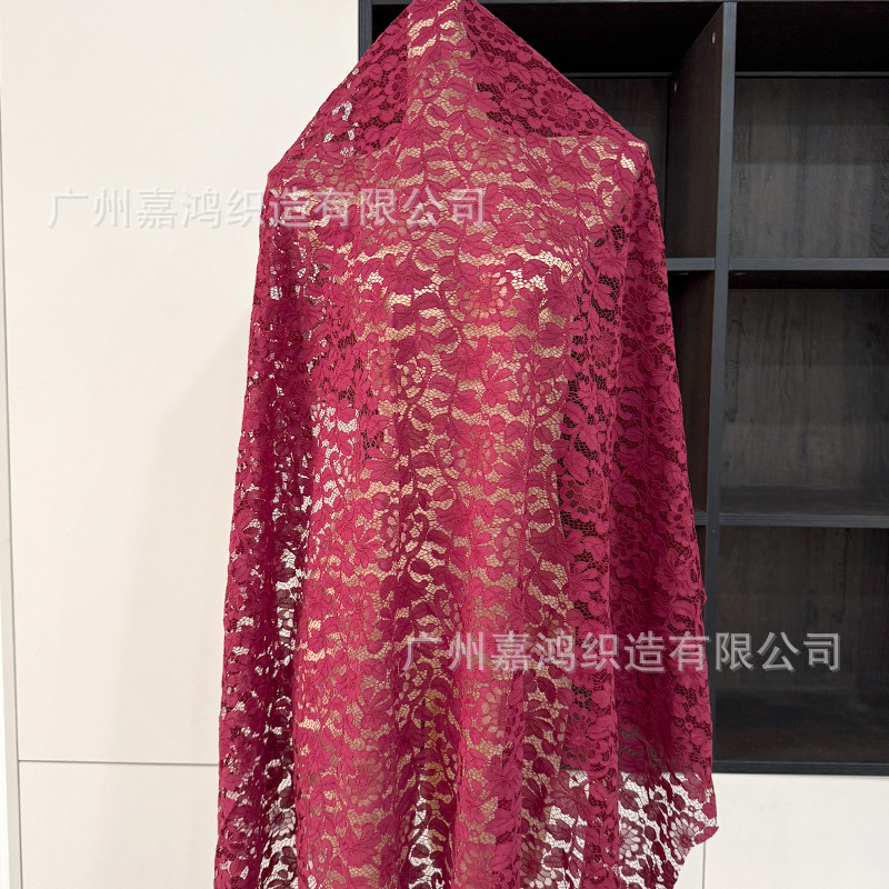 Tejido de encaje de algodón brocado flor de trompeta hueco vestido de tela de tela de decoración de tela de fábrica de ropa de mujer al por mayor
