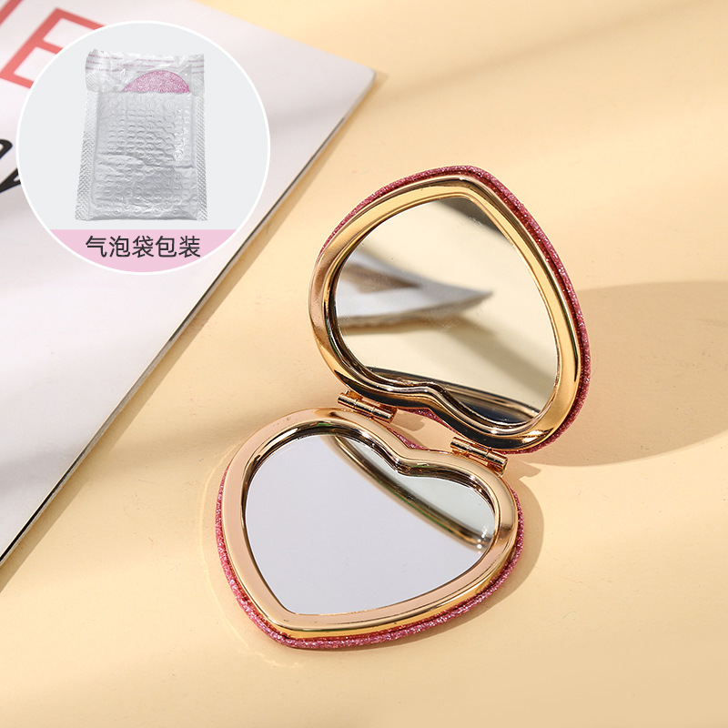 Espejo pequeño de amor de alto valor con mini dormitorio de estudiante espejo plegable de doble cara espejo de maquillaje portátil redondo