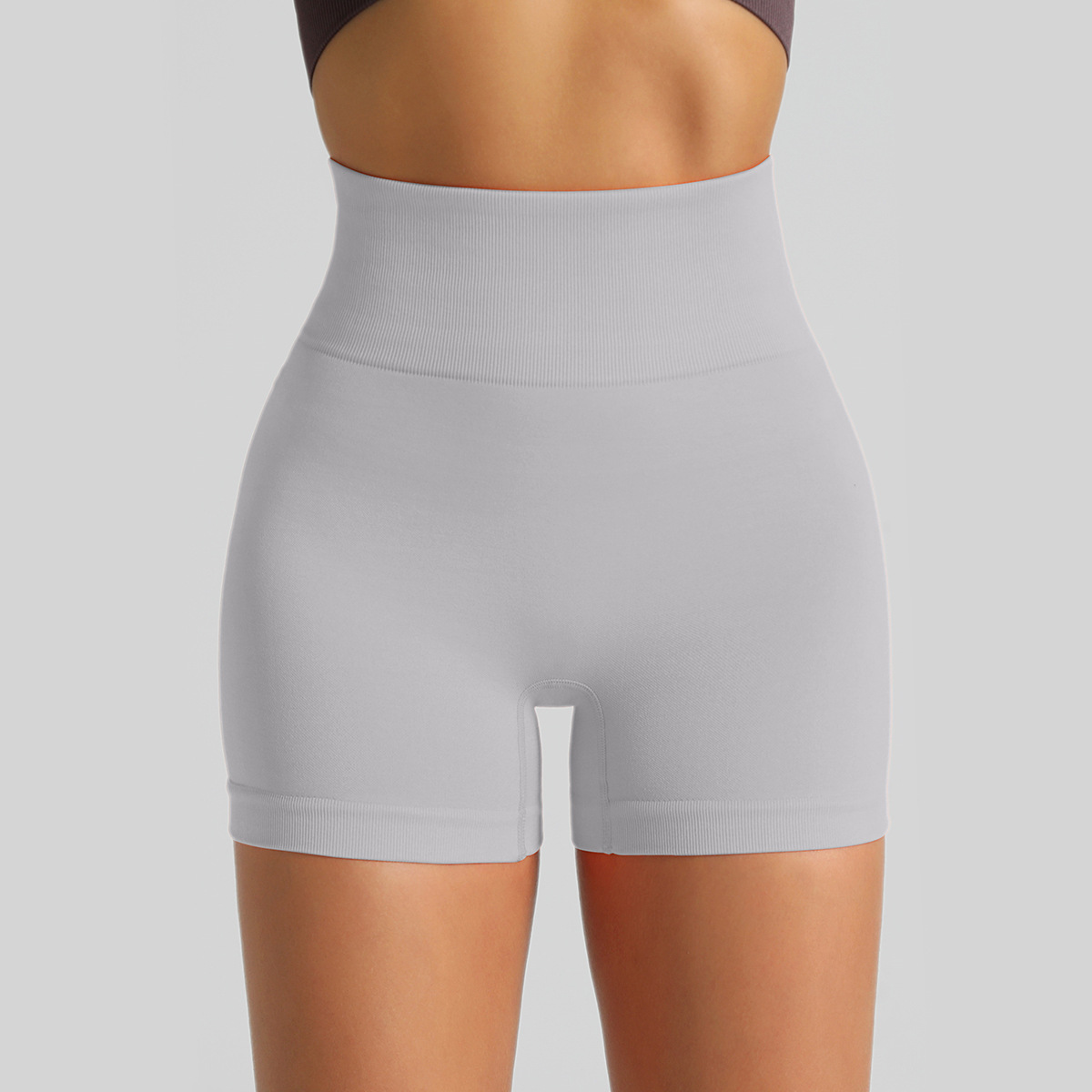 Pantalones cortos de Yoga de punto sin costuras transfronterizas Peach Hip lifting pantalones de fitness de cintura alta pantalones cortos deportivos para correr tres puntos mujeres