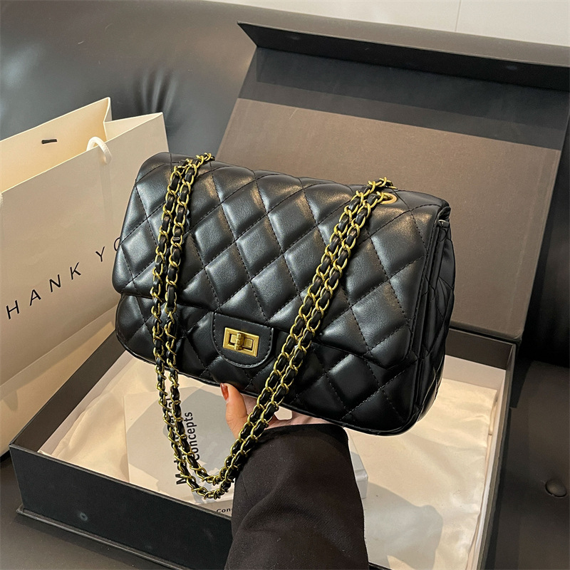 Sentido avanzado xiaoxiangfeng lingge Chain 2024 nuevos bolsos de color sólido mujeres soft Fashion 100 bolsos de hombro y axila