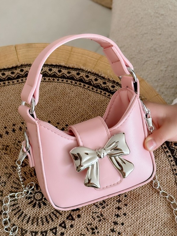 Bolso para niños 2024 nuevo estilo color caramelo arco mini bolso para niñas cadena para padres e hijos bolso de mensajero sobre rojo