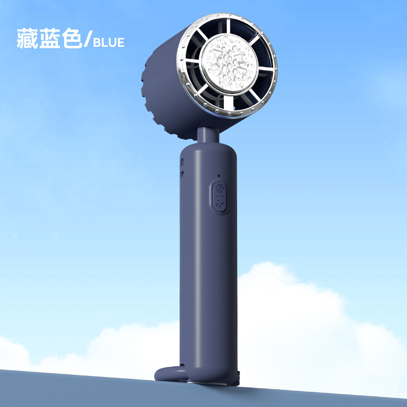 2025 nuevo ventilador pequeño portátil de mano con compresa de hielo mini ventilador de refrigeración silencioso de escritorio de carga USB pequeño