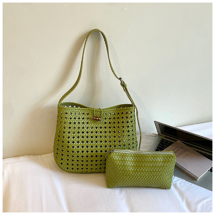 Bolsa de tejido hueco de gran capacidad para mujeres 2026 verano nuevo estilo coreano simple bolso de brazo de viaje bolsa de ocio