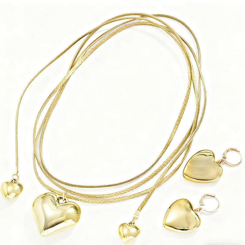 Collier et boucles d'oreilles pendantes haut de gamme pour femme, avec pendentif cœur, cordon en cuir et chaîne à plusieurs rangs._voghion.com