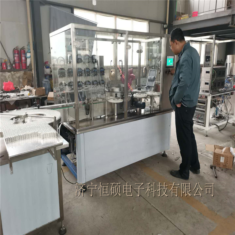 徐州4针30毫升口服液灌装机/蠕动泵灌装压塞锁盖一体机HSG-S