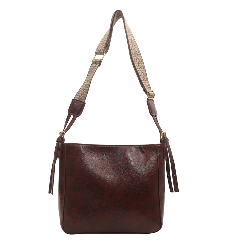 Bolso para mujeres 2024 nueva primavera y verano bolso de cubo de gran capacidad retro moda extranjera gripe bolsa de hombro de moda