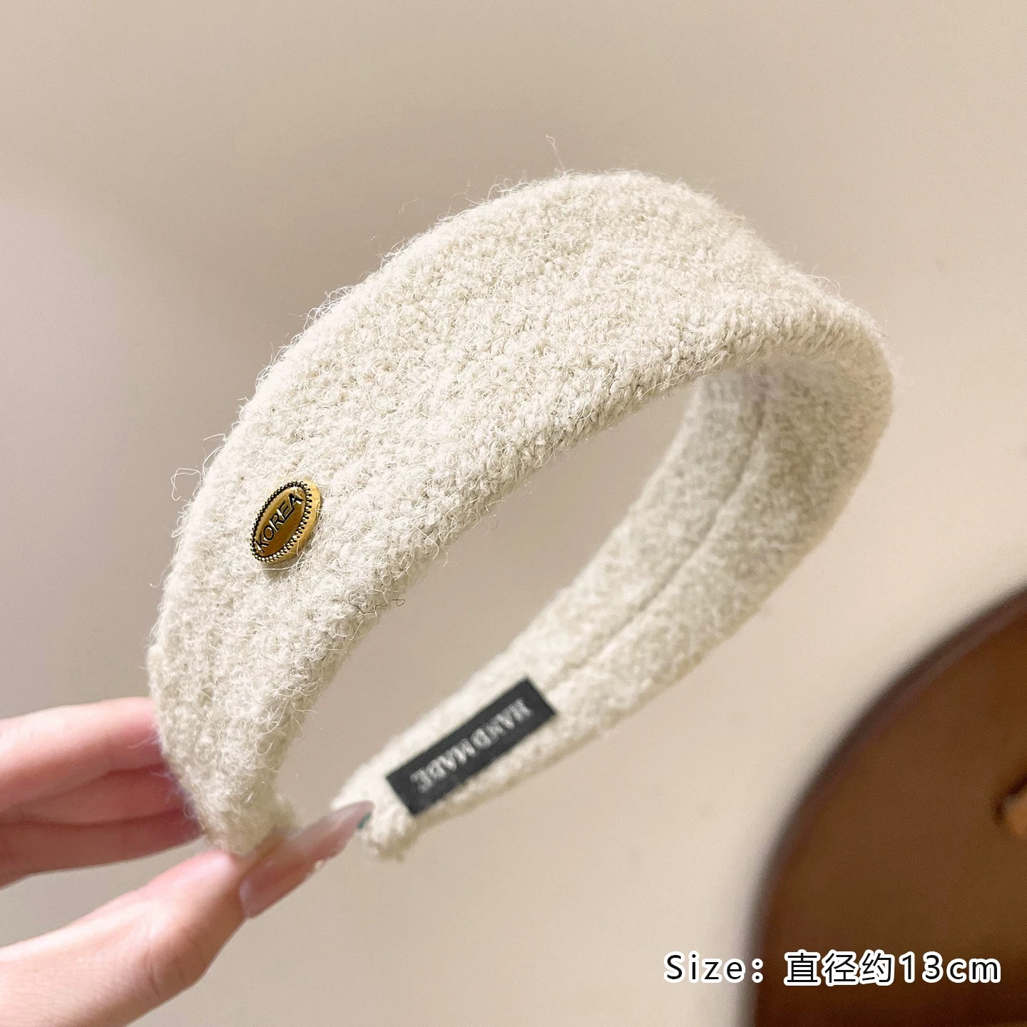 #214m color wool blend oval gold logo headband
