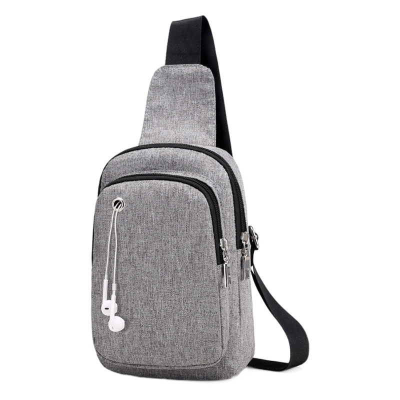 Factory wholesale men's messenger bag portable earphone hole outdoor leisure shoulder bag Korean fashion Men's chest bag
