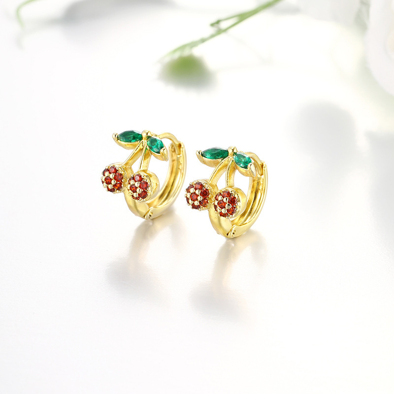 Xuping Europa y los Estados Unidos de moda transfronteriza lujosa ligera cereza orejas de cobre aleación de nicho orejas de frutas series joyas al por mayor mujeres