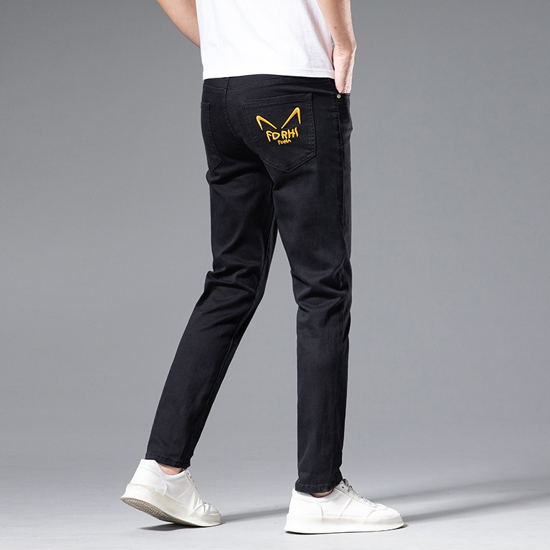 Jeans alla moda da uomo sottili primavera/estate Pantaloni con piedi elastici in cotone bianco slim fit ricamati di marca di fascia alta_voghion.com