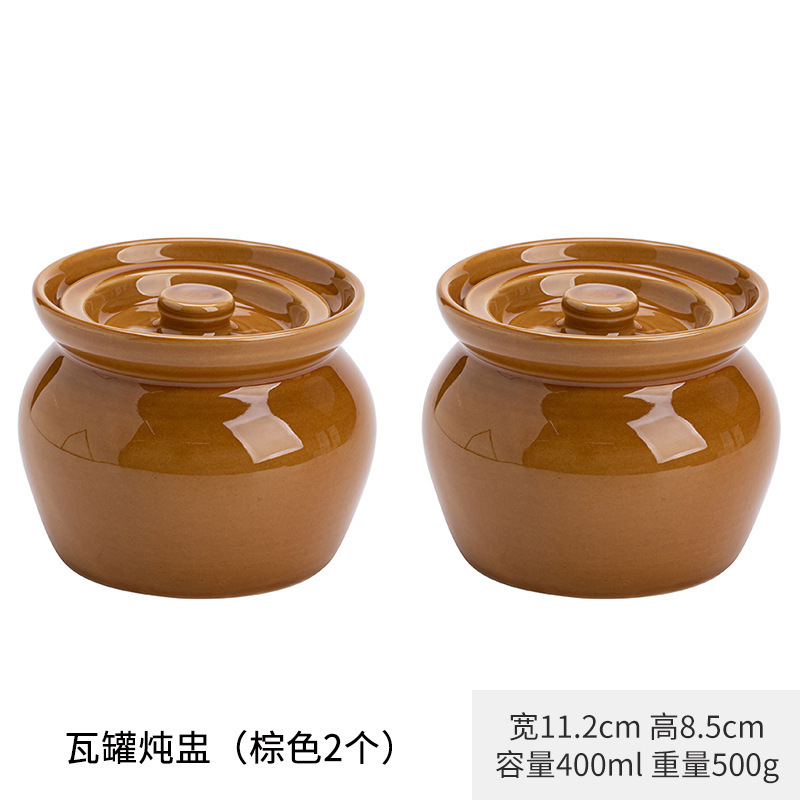 陶磁器の煮物の杯の瓦の缶は水を隔てて一人で蒸し卵の缶を食べます。|undefined