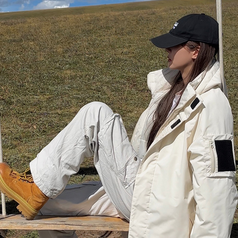 Nuevo abrigo de algodón de pluma para mujeres 2024 invierno engrosado intercalado de algodón de asalto ropa coreana impermeable pareja abrigo de moda