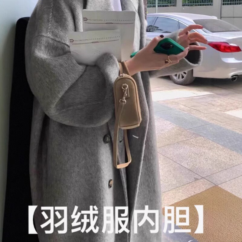 ダウンジャケットの中の大胆なカシミヤのコートを感じます。|undefined