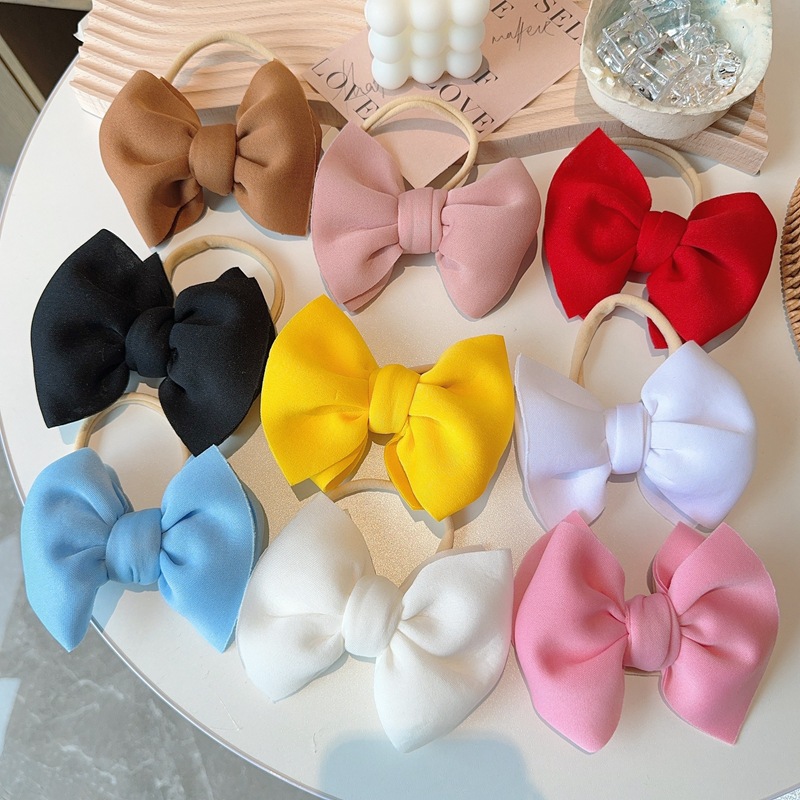 space three dimensional elastic children's hair accessory with bow