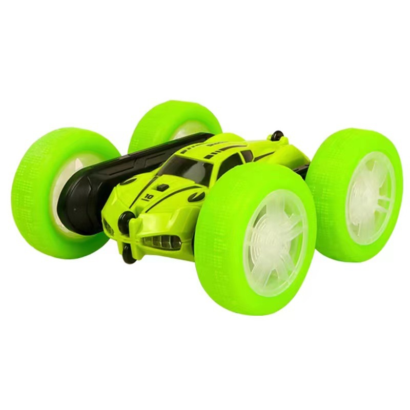 La nueva deriva de tracción en las cuatro ruedas de 2.4G, conducción de doble cara, brazo oscilante, coche volquete, luz fresca, coche de control remoto para niños, juguete