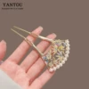 Two tooth-Fang Fan