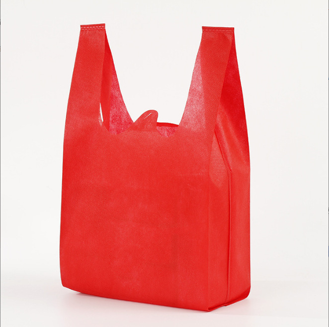 Bolsas de tela no tejida en stock bolsas de compras bolsas de chaleco impresión en color logotipo y patrón publicitario bolsas ecológicas