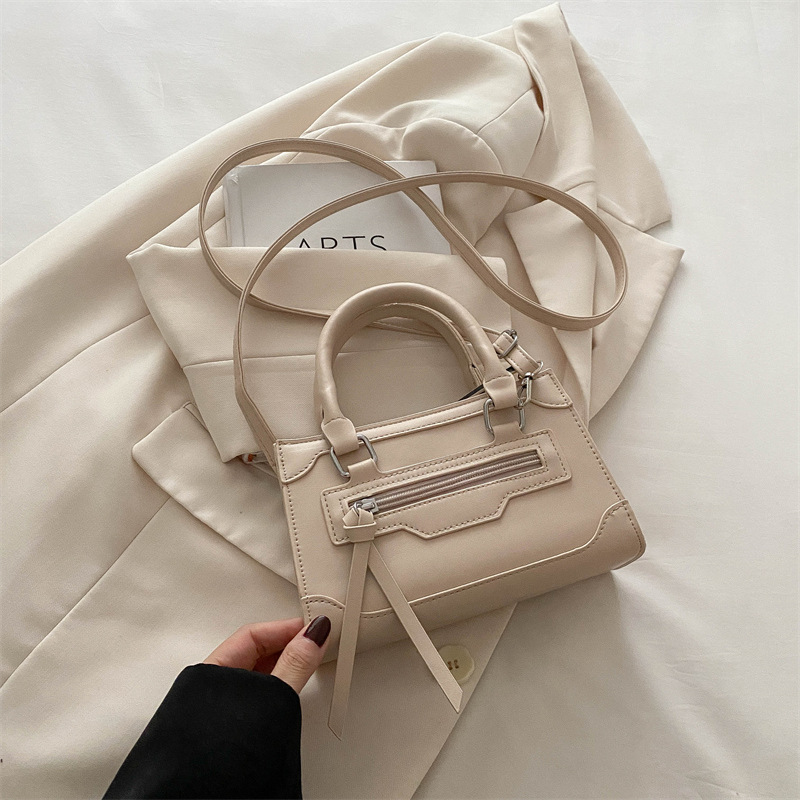 Bolso bolso femenino 2024 nuevo bolso de motocicleta retro de moda textura nicho todo fósforo bandolera