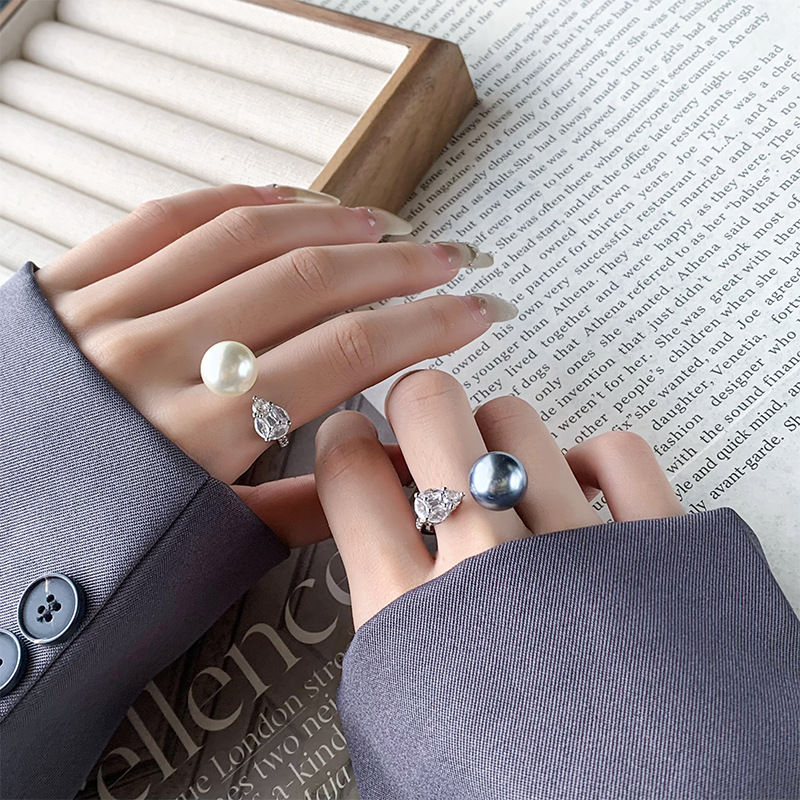 2024 nueva joyería cobre chapado en platino perla estilo simple anillo diario mujer 12mm al por mayor