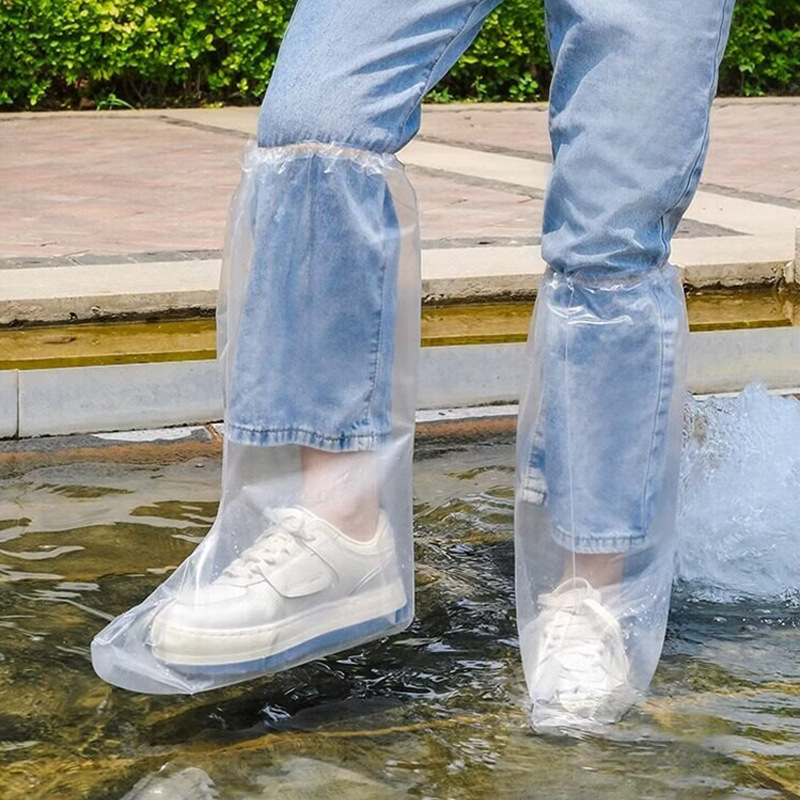 Disposable long PE rain boot covers, transparent, thickened, non-slip, waterproof, and wear-resistant, for indoor and outdoor use, providing protection during rainy weather
