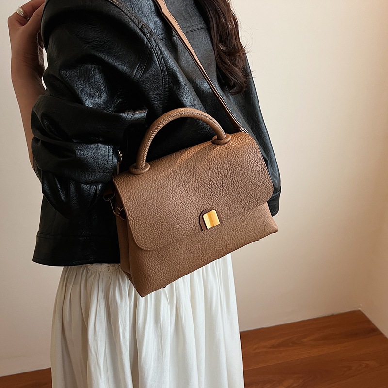 Bolso de moda coreano 2025 verano nuevo bolso femenino casual con patrón de lichi bolso de hombro simple bolso de mensajero de viaje