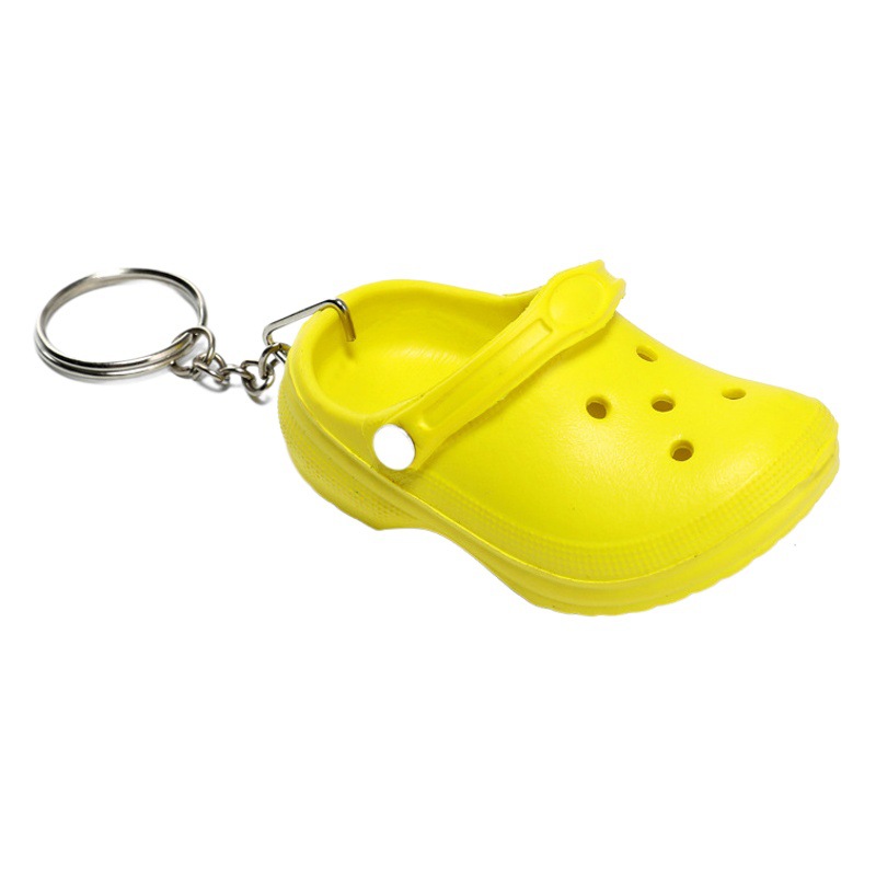 Directo de fábrica nuevo llavero colgante zapatillas accesorios mini agujero zapatos pequeños zapatos hebilla mochila colgante adornos