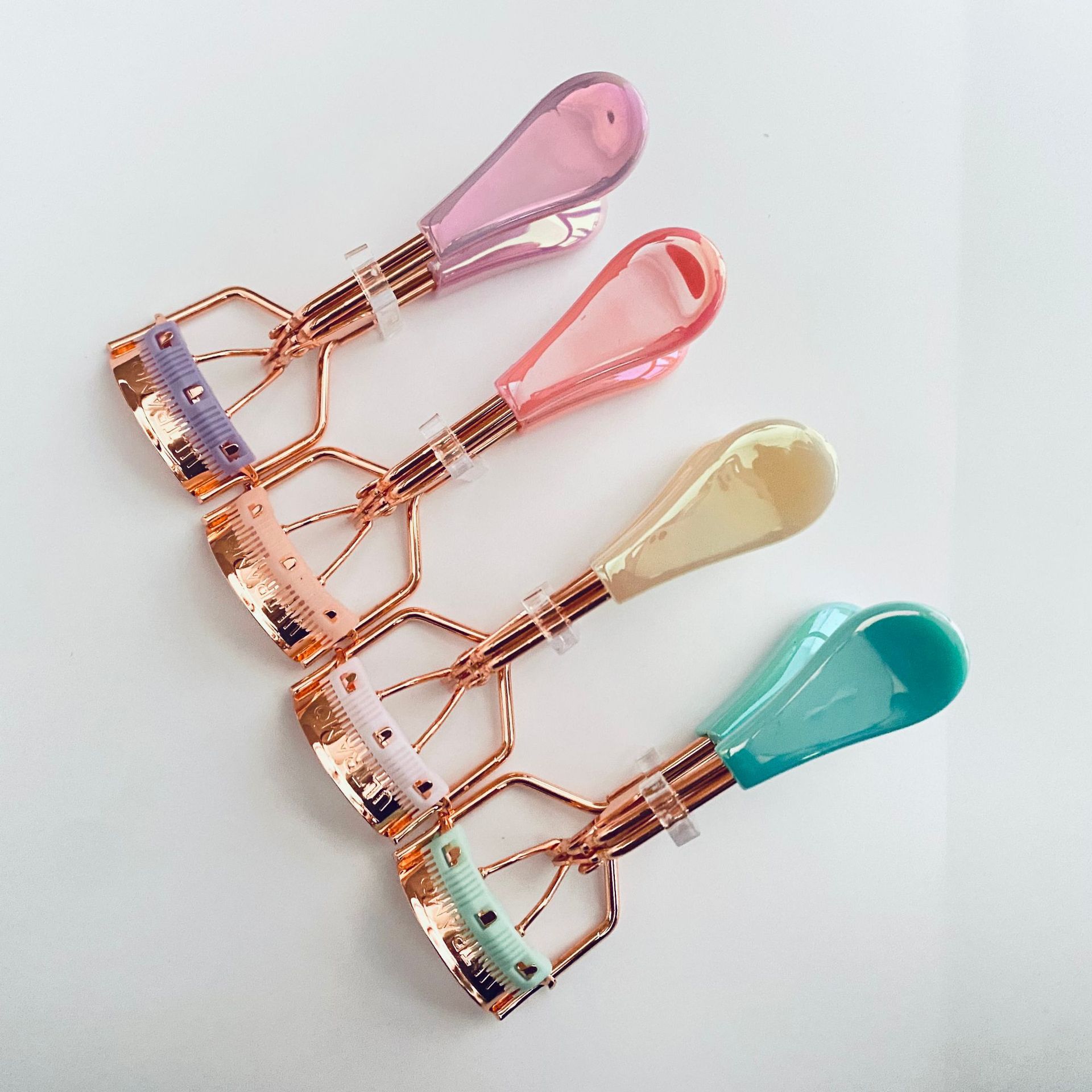 Rizador de pestañas de gran angular muestra gratis rizador de pestañas parcial herramienta de belleza rizador de pestañas portátil rizador de pestañas de belleza al por mayor