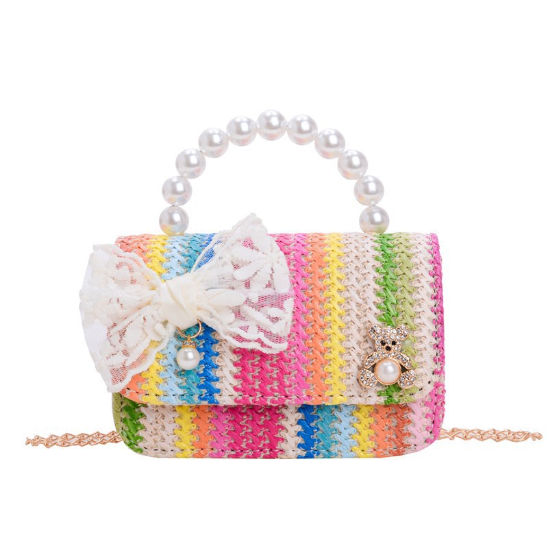 Verano nuevo arco de paja bolso de perla bolso de moda para niños bolso de princesa de jardín de infantes