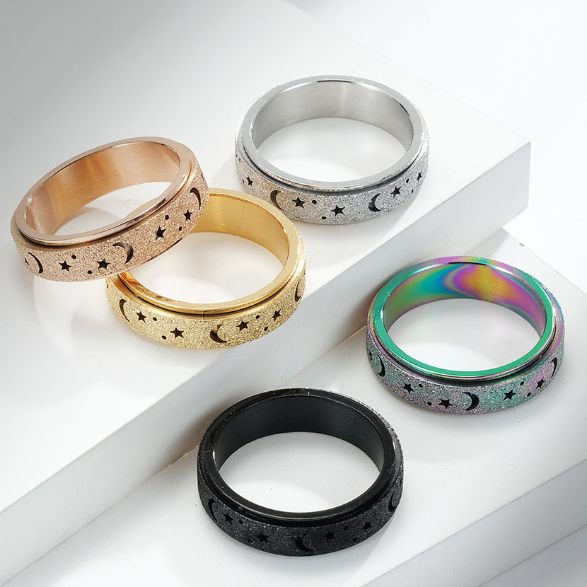 Amazon Frosted Hollow estrella Luna Acero inoxidable anillo giratorio alivio estrés titanio acero anillo de las mujeres pulsera