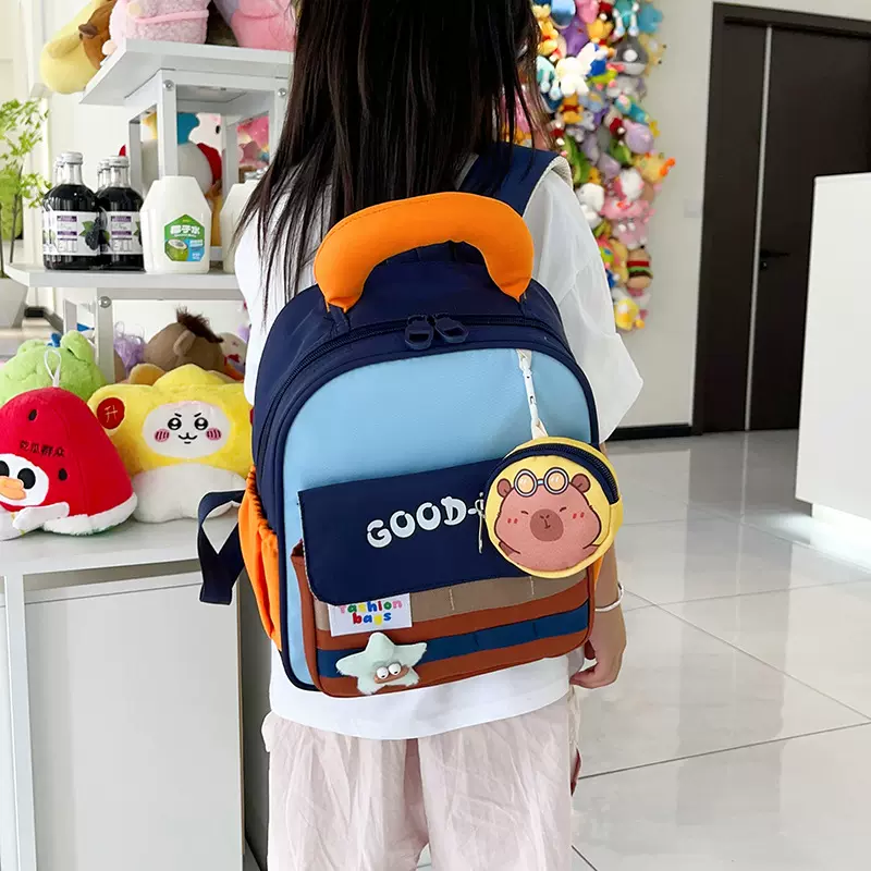 跨境幼儿园书包新款撞色轻便护脊儿童双肩包卡通字母女孩宝宝背包