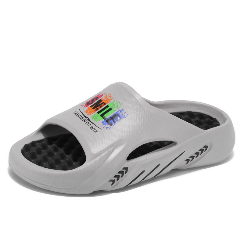 Red celebridad en vivo de verano masaje fondo de dos colores EVA zapatillas frías usar una zapatilla transfronteriza zapatillas grandes para hombres y mujeres