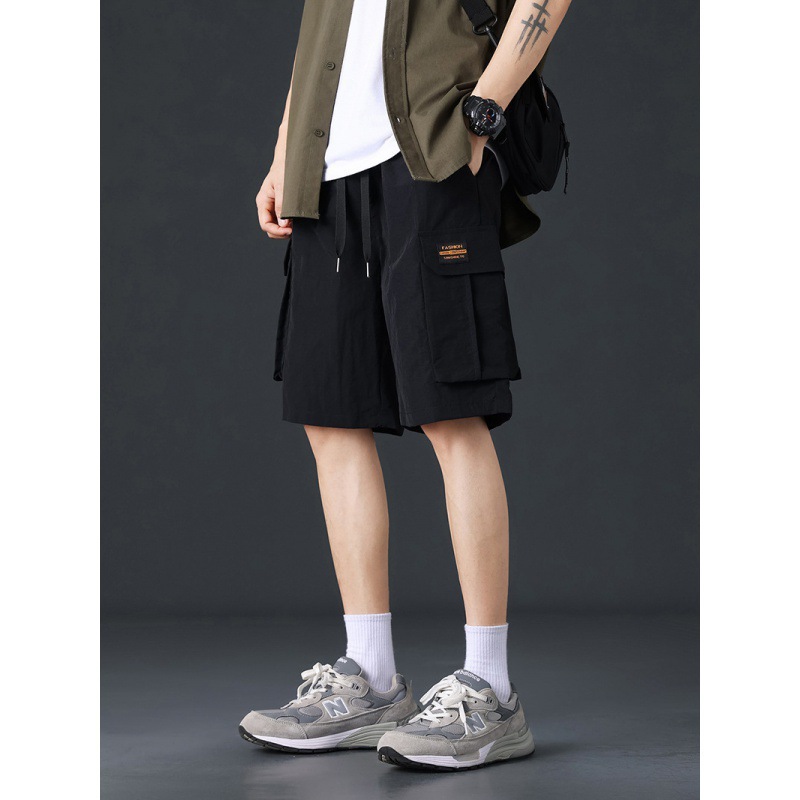 Pantalones cortos de trabajo de seda de hielo para hombres de verano delgados estilo de moda versátil vientos de puerto pantalones casuales deportivos sueltos