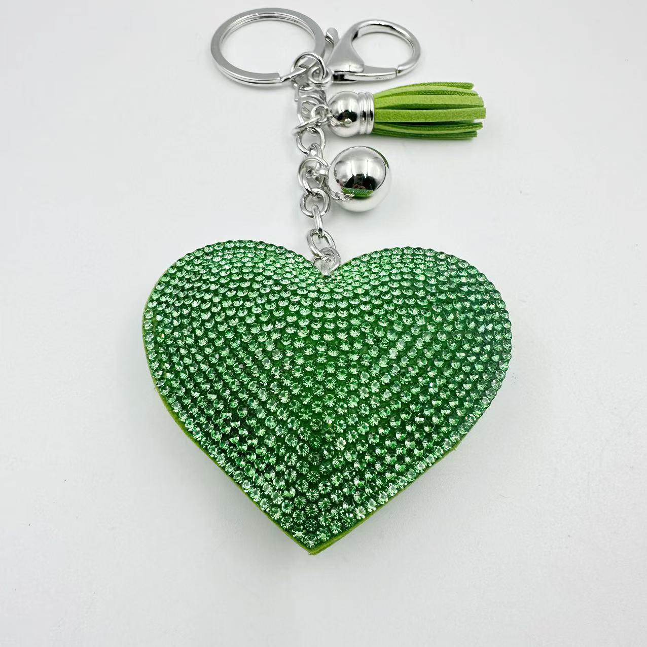 Estilo explosivo transfronterizo pequeño corazón de melocotón fragante llavero de cuero de diamantes calientes amor borla bolso colgante franela llave de diamantes