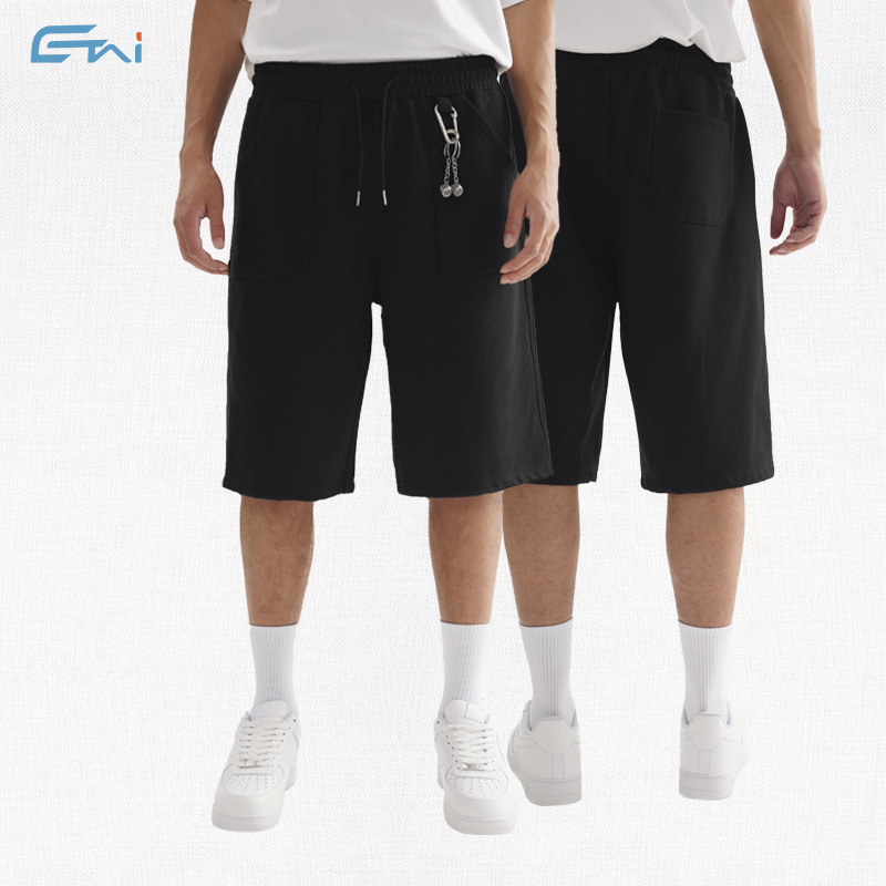 Pantalones cortos casuales de rodilla de alta calidad, pantalones cortos de hombre sueltos, pantalones de moda juveniles de siete puntos.