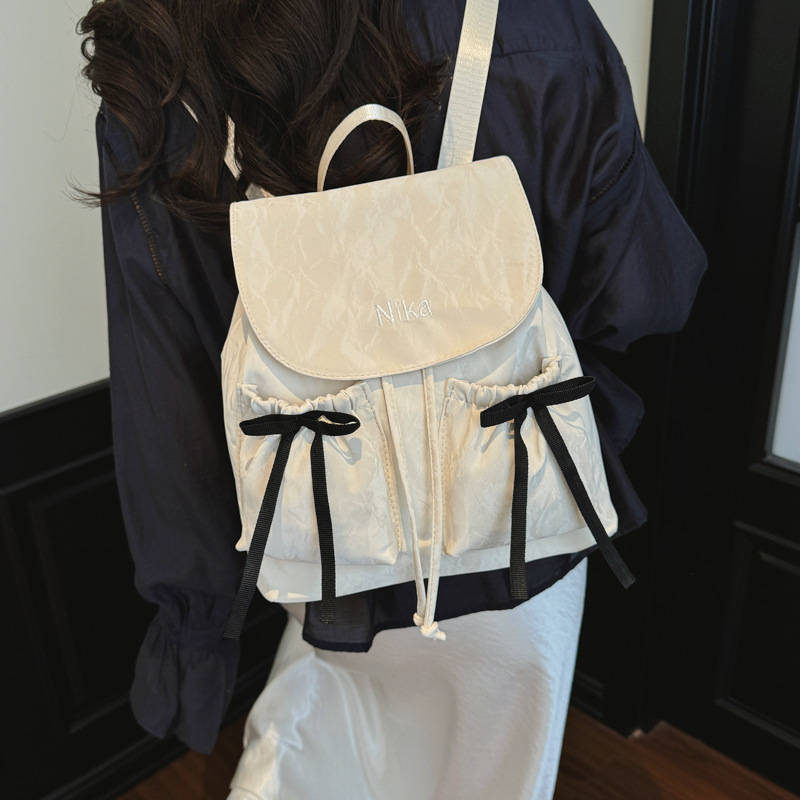 Bolsa de hombro de arco de mujer verano 2026 nueva moda coreana nicho popular mochila de hombro de gran capacidad