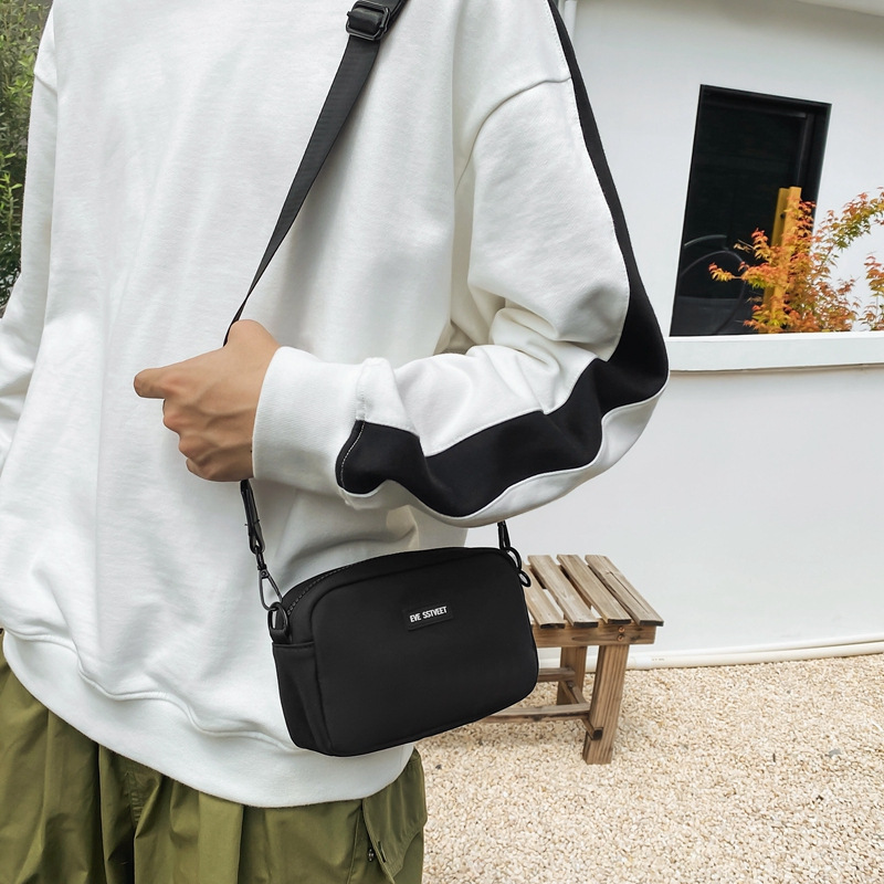 Nuevo tipo de mochila casual para hombres bolsos móviles, mochila de moda ligera, mochila japonesa simple y universal.