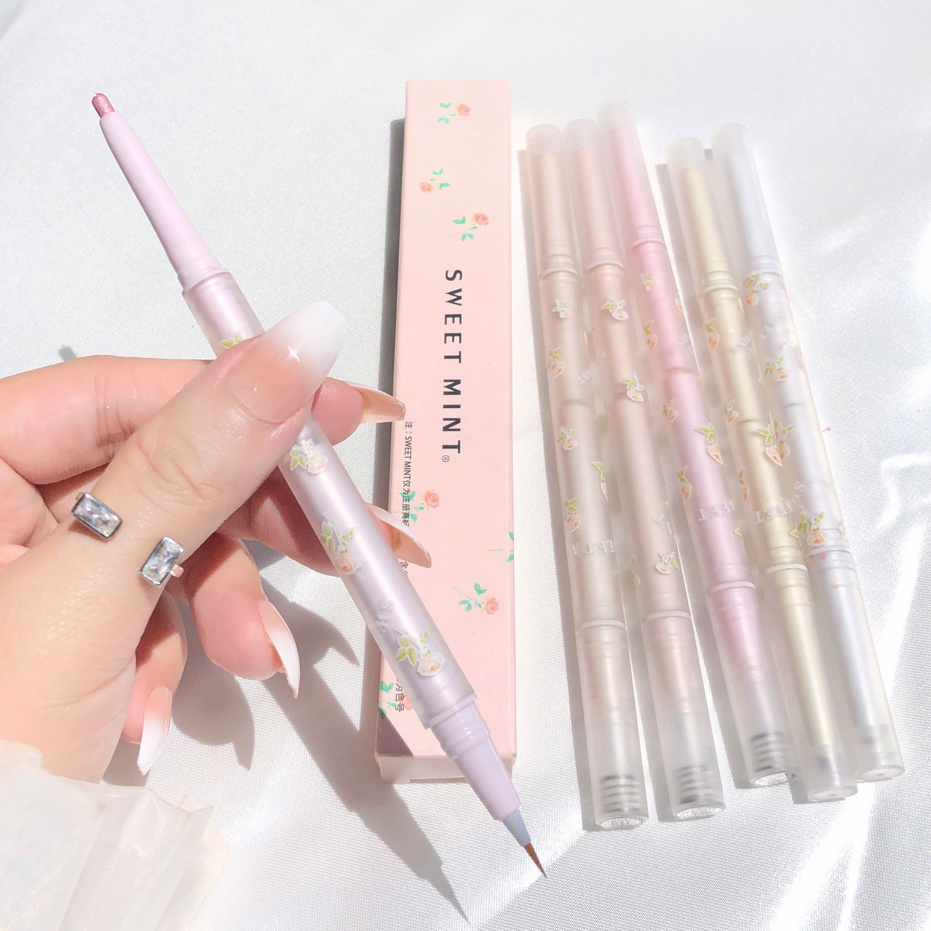 SWEET MINT's Splendid Flower Season Double-headed Silkworm pen with pearlescent and matte finishes to brighten the eyes and face, down to two-in-one undefined
