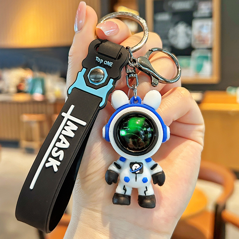 Nuevo astronauta cielo estrellado conejo llavero pvc llavero de goma suave bolsa de pareja colgante de muñeca tridimensional al por mayor