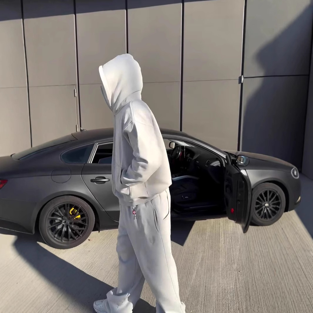 2025 tendencia estadounidense color sólido cuello alto otoño e invierno marca de moda personalidad sudadera con capucha simple cárdigan suéter traje hombres y mujeres