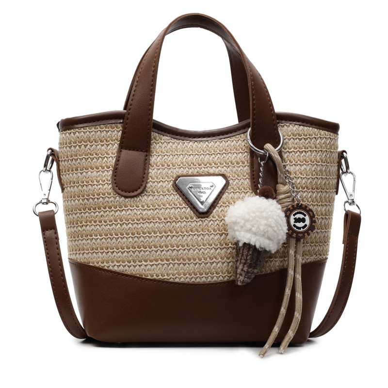 Bolso de mano de color de contraste tejido de estilo caliente de verano para mujer 2025 nuevo bolso de cubo simple salvaje estilo occidental para mujer