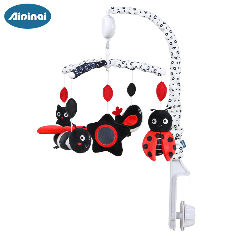 Nueva cama giratoria de música para niños Bell bebé anti-estrabismos cama colgante de juguete negro y rojo bebé felpa campana de noche al por mayor