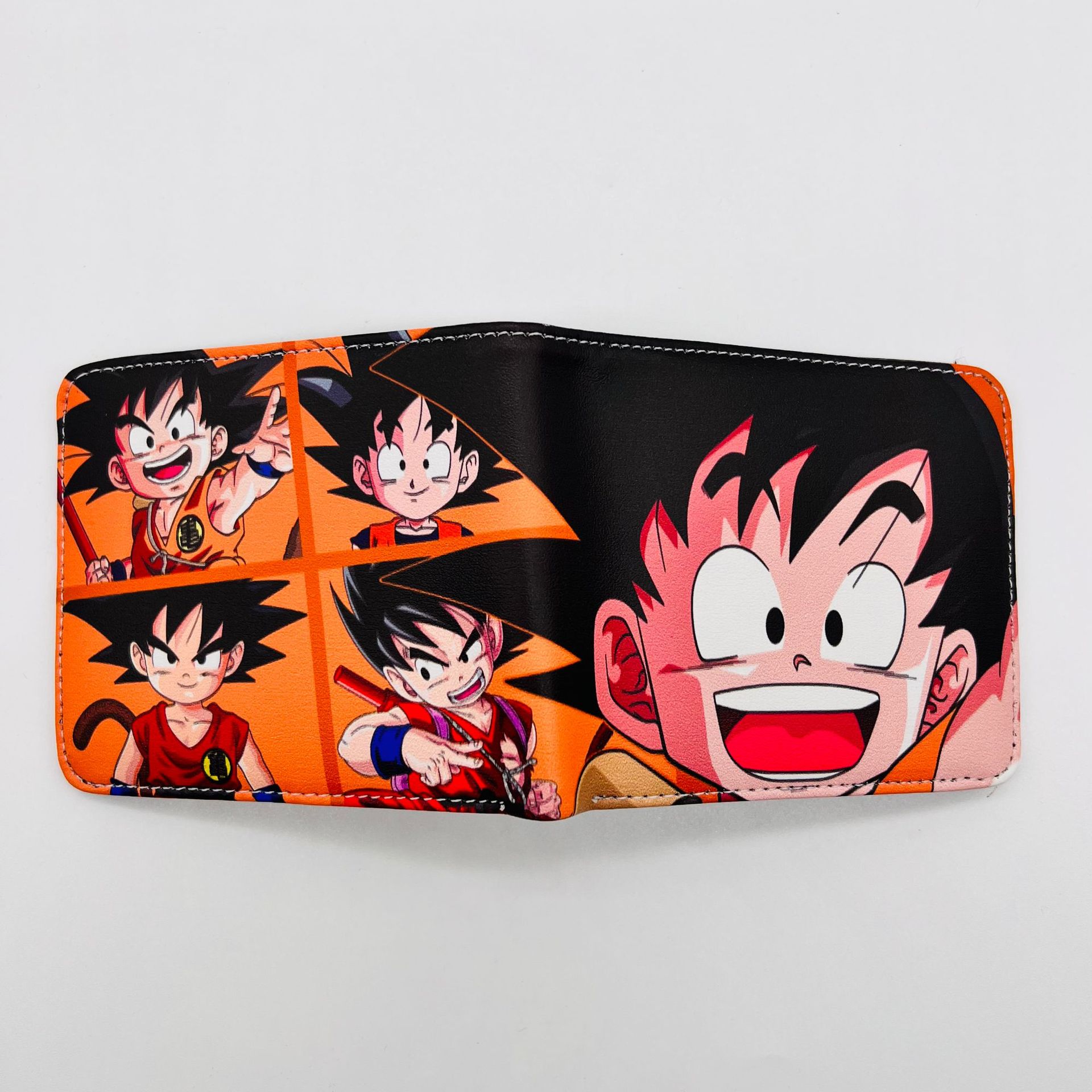 Anime Dragon Ball periférico dinero corto wukong Wu palabra estudiantes masculinos y femeninos corto monedero titular de la tarjeta en stock