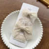 Завязанный бант с кружевом (заколка)