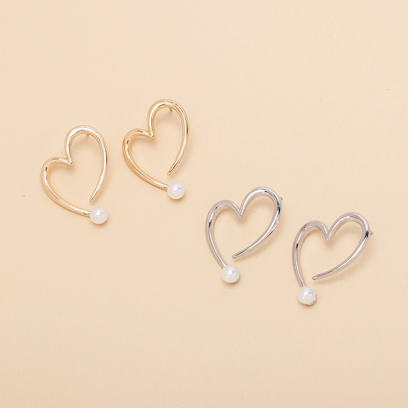 6g Weight Earrings Classification Wedding, Travel Occasion Women'S Gender Gold, Silver Color Wholesale Jewelry Irregular Hollow Heart Pearl Stud Earrings Nihaojewelry 5