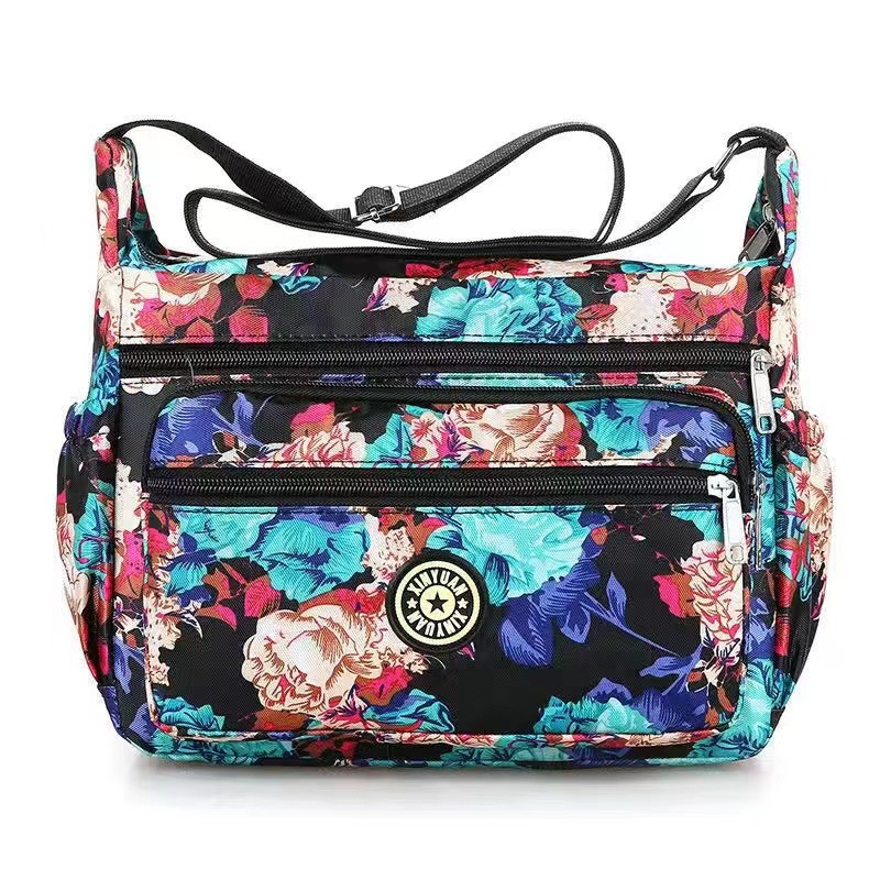 Bolsa de tela de flores bolsa de mensajero de las mujeres nueva bolsa de Madre de gran capacidad bolsa de hombro individual de mediana edad y ancianos bolsa de tela Oxford bolsa